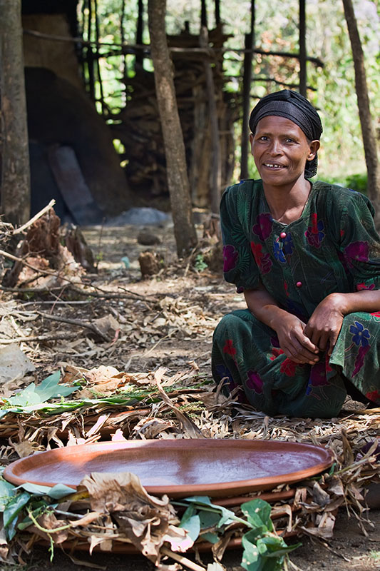 251   Gurage woman selling injera plates